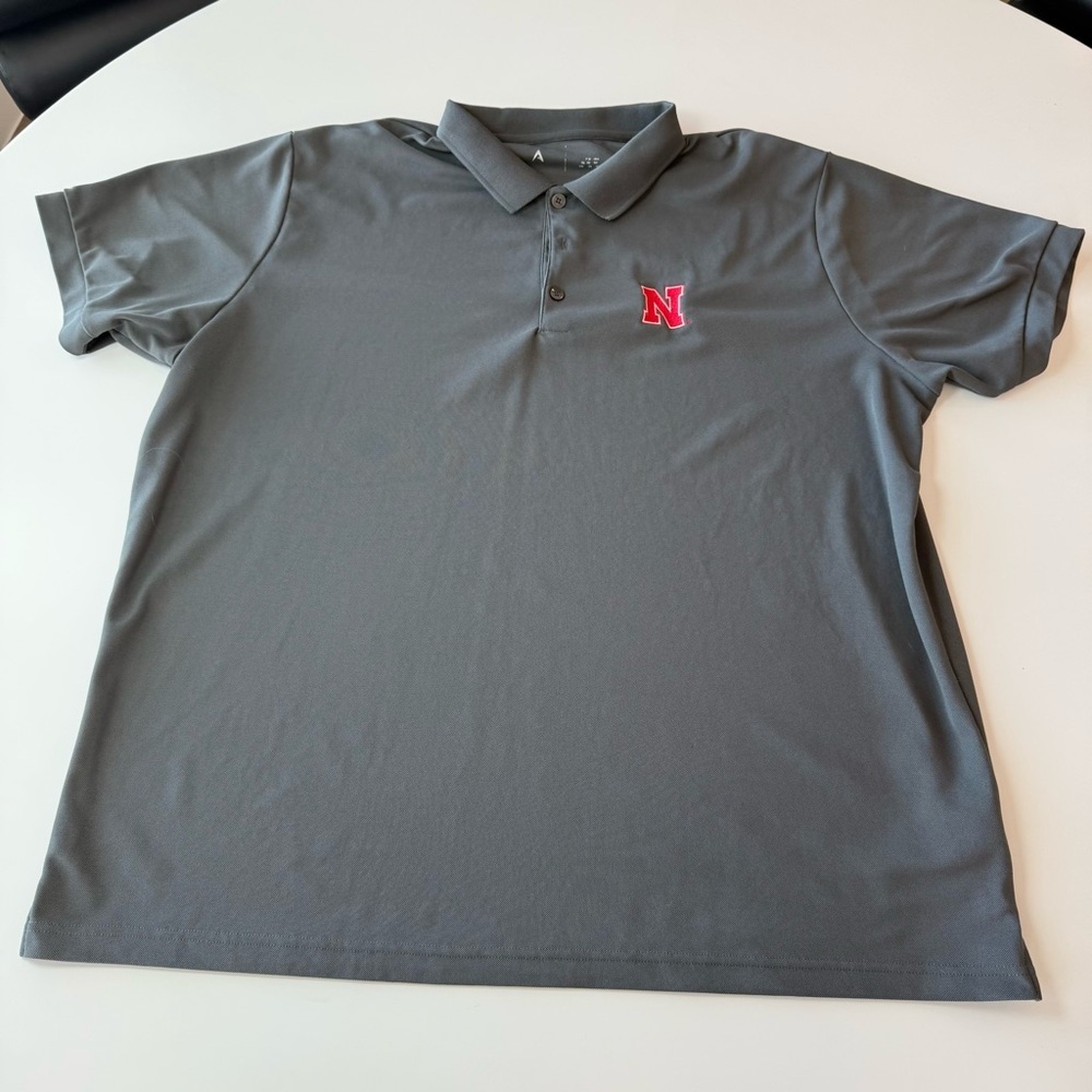 Nebraska Gray Polo Shirt with Red Emblem
